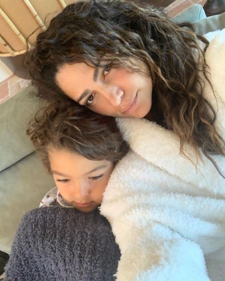 Camila Alves rests with her youngest son Livingston Alves McConaughey. Both look cozy in their robes. 